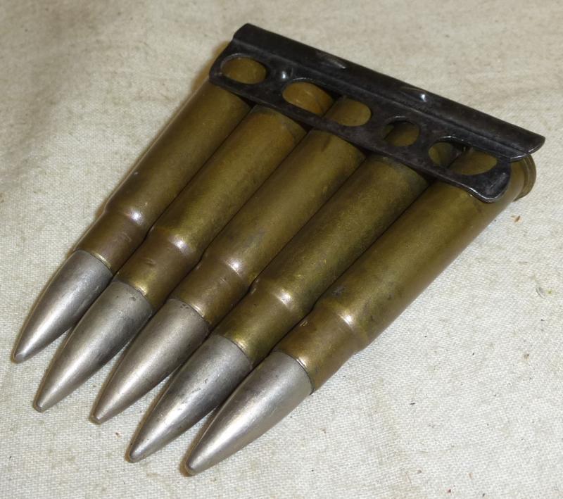 .303 Early MkII. Enfield Slotted Base Clip with 1915 Dated Rounds